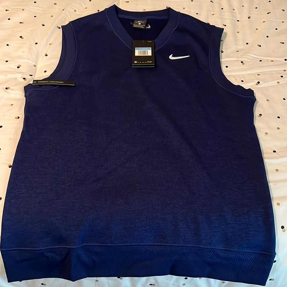 Nike Dri Fit sweater vest. Brand new with tags size medium. Navy blue.